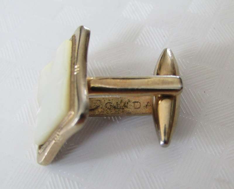 Vintage gilt cufflinks with mother of pearl decoration signed Gilda Stratton
