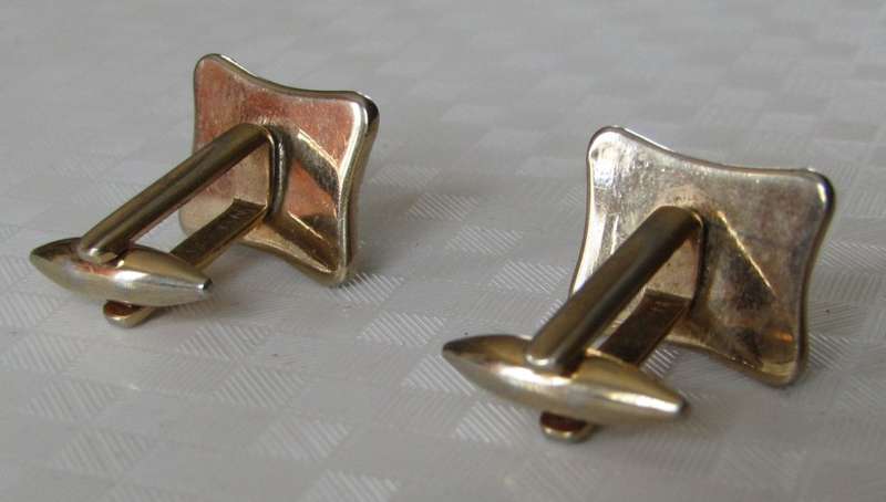 Vintage gilt cufflinks with mother of pearl decoration signed Gilda Stratton
