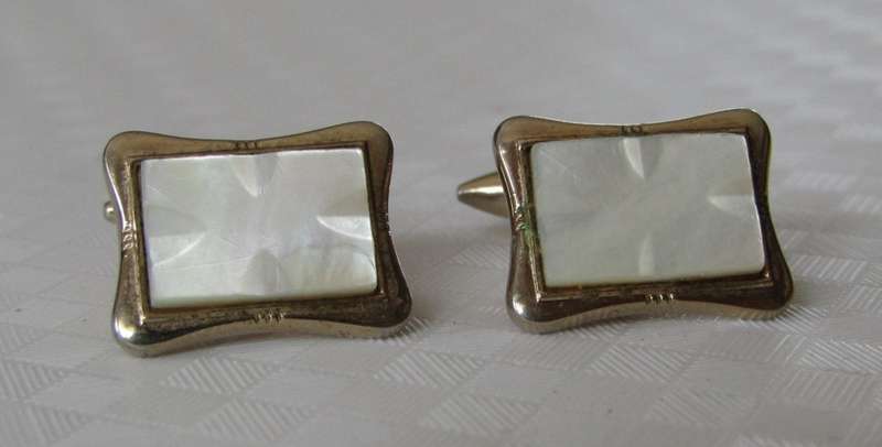 Vintage gilt cufflinks with mother of pearl decoration signed Gilda Stratton