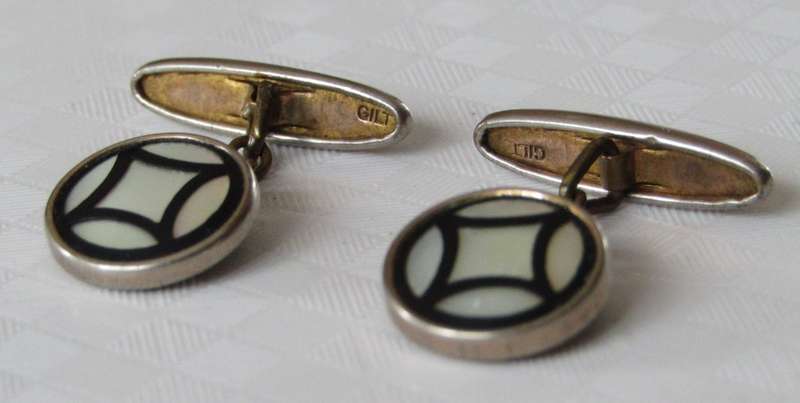 Vintage Art Deco mother of pearl and onyx cufflinks marked `Gilt`