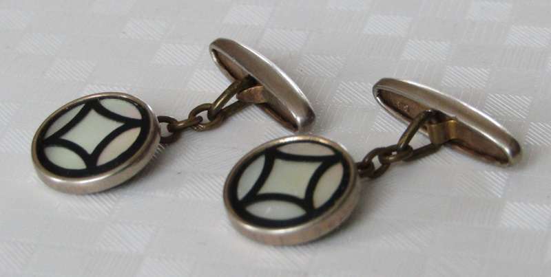 Vintage Art Deco mother of pearl and onyx cufflinks marked `Gilt`