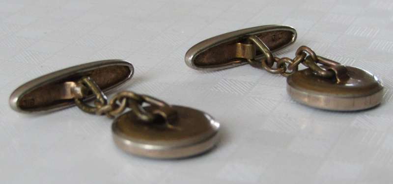 Vintage Art Deco mother of pearl and onyx cufflinks marked `Gilt`