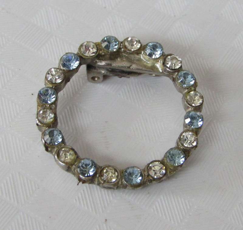 Vintage Silver Tone Circle of Life Brooch/Hat Pin with Clear and Light Blue Rhinestones