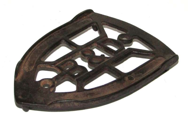 Antique Cast Iron Trivet made by Bless and Drake c1920