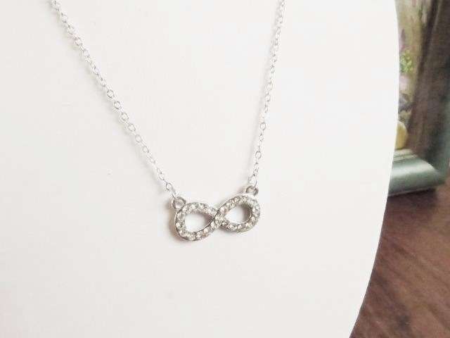 Infinity pendant on a silver tone chain