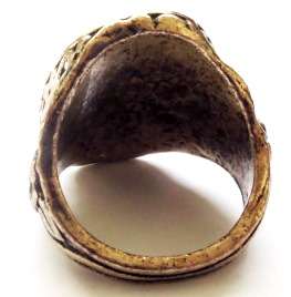 Gold tone fashion ring with a light yellow oval stone