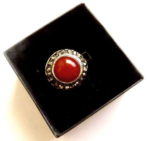 Antique silver tone fashion ring with smooth round red stone