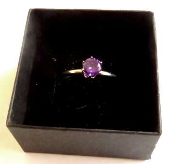 Small fashion ring with purple stone