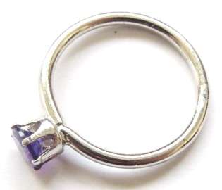 Small fashion ring with purple stone