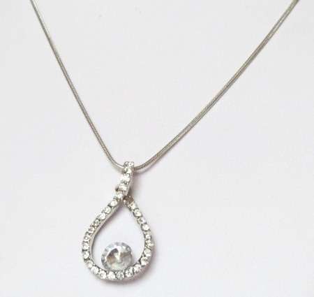 A tear drop pendant with big stone and silver tone chain