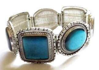 Silver tone fashion bracelet with turquoise stones