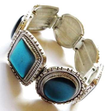 Silver tone fashion bracelet with turquoise stones