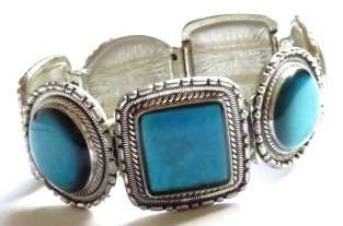 Silver tone fashion bracelet with turquoise stones