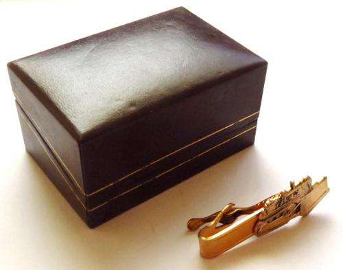 Vintage gold tone bulldozer tie pin in original Caress Jewellers box