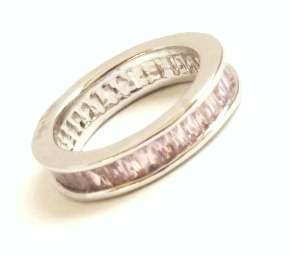 Silver tone fashion ring with a pink stone (Size 8.5)