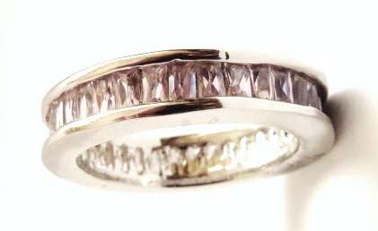 Silver tone fashion ring with a pink stone (Size 8.5)