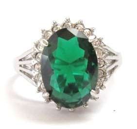 Fashion ring with emerald stone in classic setting (Size 8)