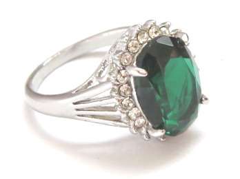 Fashion ring with emerald stone in classic setting (Size 8)