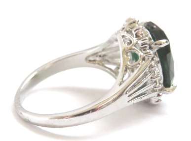 Fashion ring with emerald stone in classic setting (Size 8)
