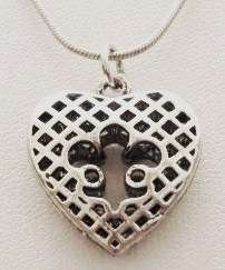 Silver tone heart pendant on a chain