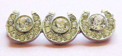 Vintage silver tone and sparkling clear stone horseshoe brooch pin