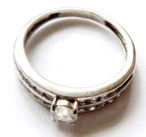 A pretty little 925 silver ring white diamond stones