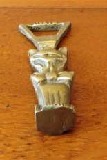 Vintage solid brass bottle opener with a Sumerian theme