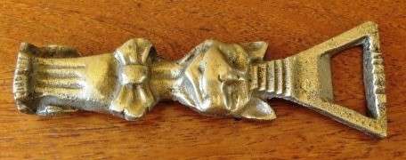 Vintage solid brass bottle opener with a Sumerian theme