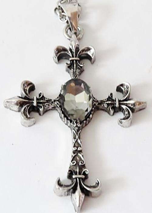 Fleur de lis cross pendant on a long silver tone chain