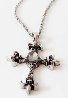 Fleur di lis cross pendant on a long silver tone chain