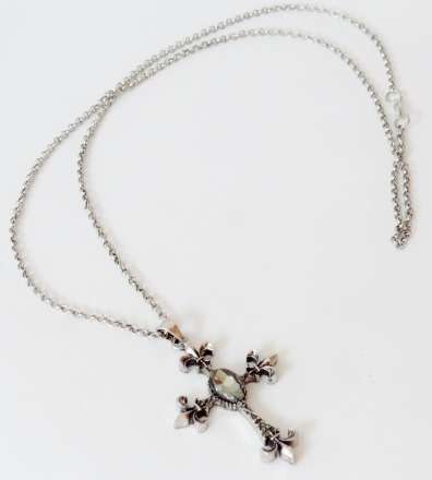 Fleur di lis cross pendant on a long silver tone chain