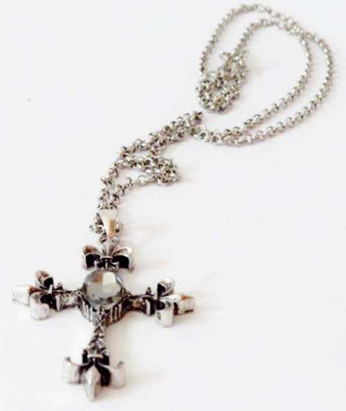 Fleur di lis cross pendant on a long silver tone chain