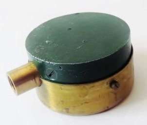 Small antique cast iron pressure gauge with brass plated trim in original case with 3 needles