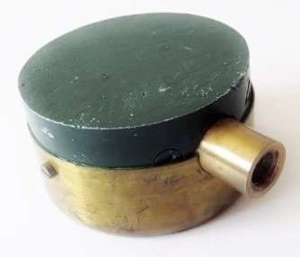 Small antique cast iron pressure gauge with brass plated trim in original case with 3 needles