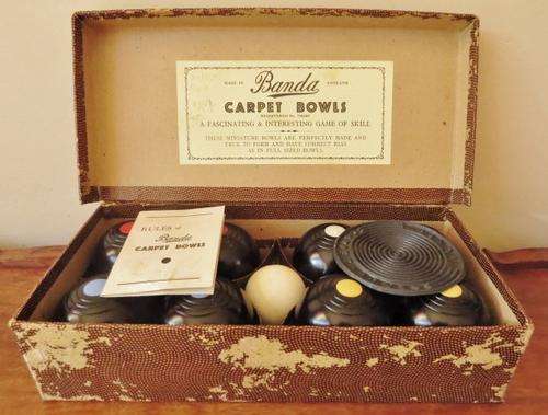 Vintage 1930's set of Banda carpet bowls in original box with rules booklet and rubber toe mat