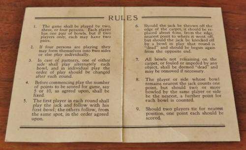Vintage 1930's set of Banda carpet bowls in original box with rules booklet and rubber toe mat
