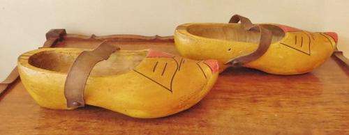 A very old pair of used Dutch clogs with leather straps