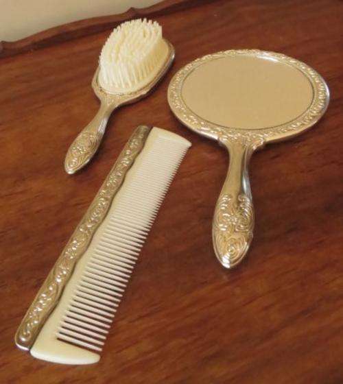 Vintage ornate silver plated dresser set in original box