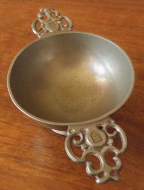 Vintage European pewter double handled porringer bowl on a raised foot