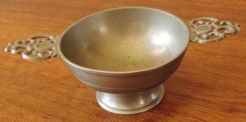 Vintage European pewter double handled porringer bowl on a raised foot