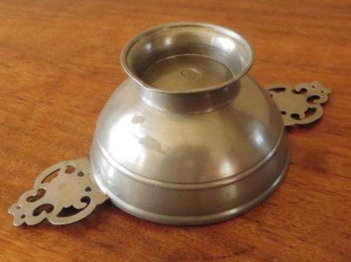 Vintage European pewter double handled porringer bowl on a raised foot