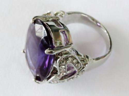 Chunky silver tone fashion ring with big purple stone and clear stone hearts (Size 10)
