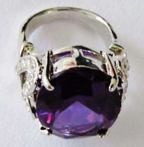 Chunky silver tone fashion ring with big purple stone and clear stone hearts (Size 10)