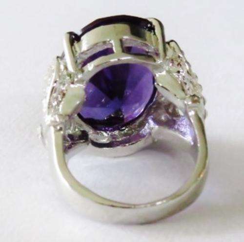 Chunky silver tone fashion ring with big purple stone and clear stone hearts (Size 10)