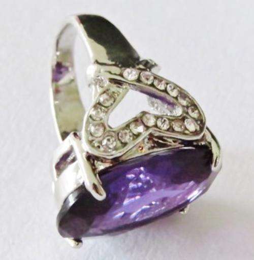 Chunky silver tone fashion ring with big purple stone and clear stone hearts (Size 10)