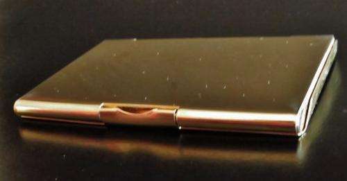 Vintage gold tone and faux leather business card holder