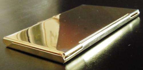 Vintage gold tone and faux leather business card holder