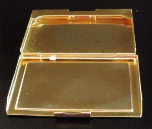Vintage gold tone and faux leather business card holder