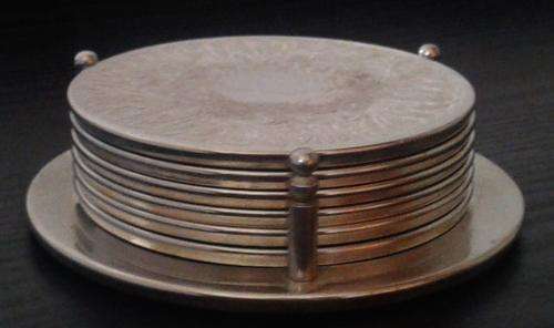 Set of silver plated coaster set