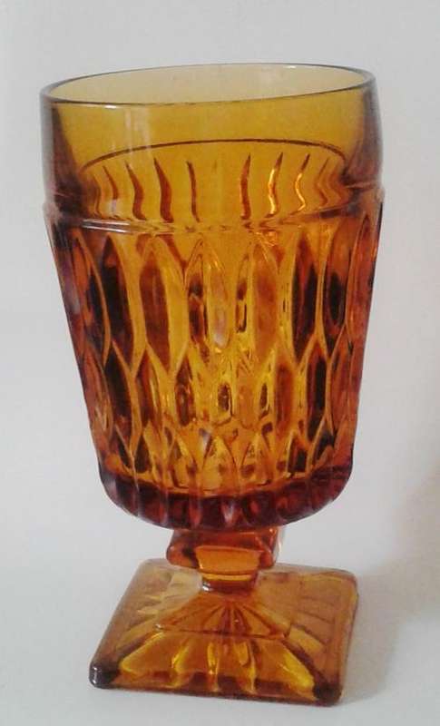 Vintage amber glass pedestal vase